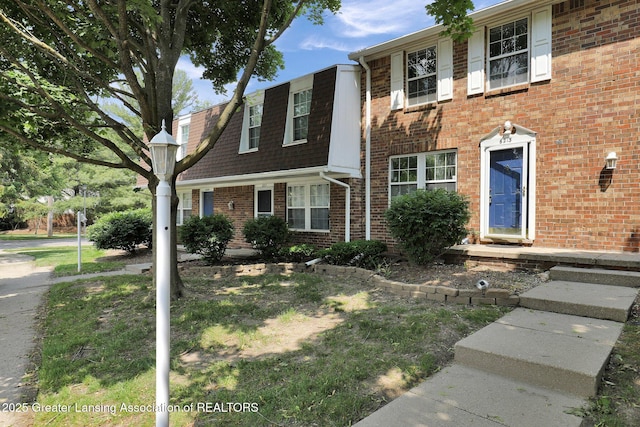 6213 Beechfield Dr, Lansing, MI 48911 - view of front of home with brick siding