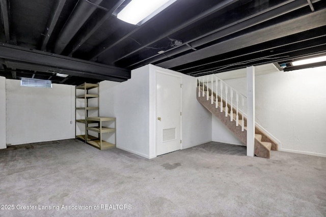 6213 Beechfield Dr, Lansing, MI 48911 - finished basement featuring stairway and carpet flooring