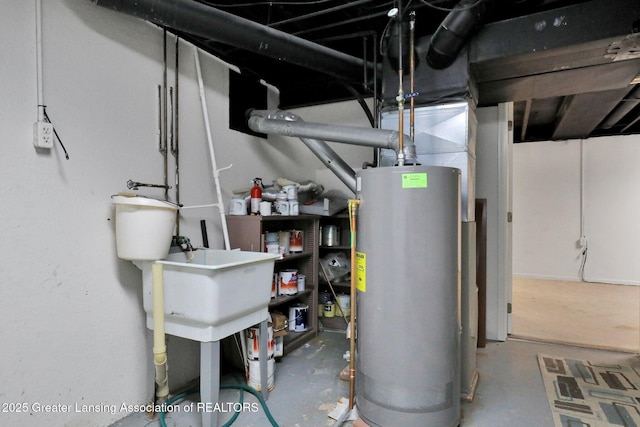 6213 Beechfield Dr, Lansing, MI 48911 - utility room with water heater