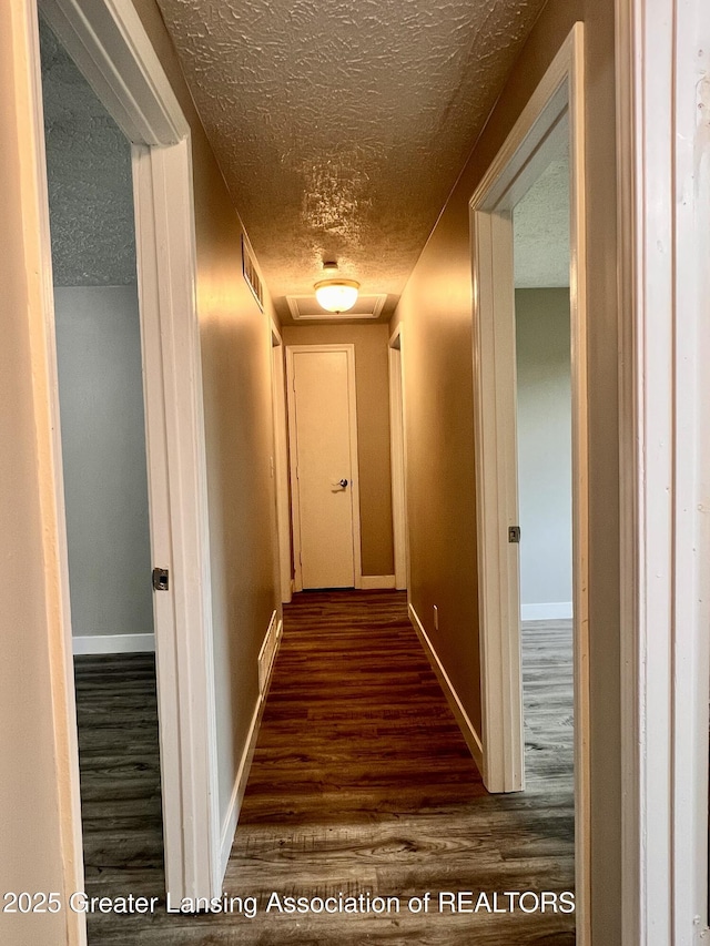 5401 Catalpa Dr, Lansing, MI 48911 - hall with a textured ceiling and wood finished floors