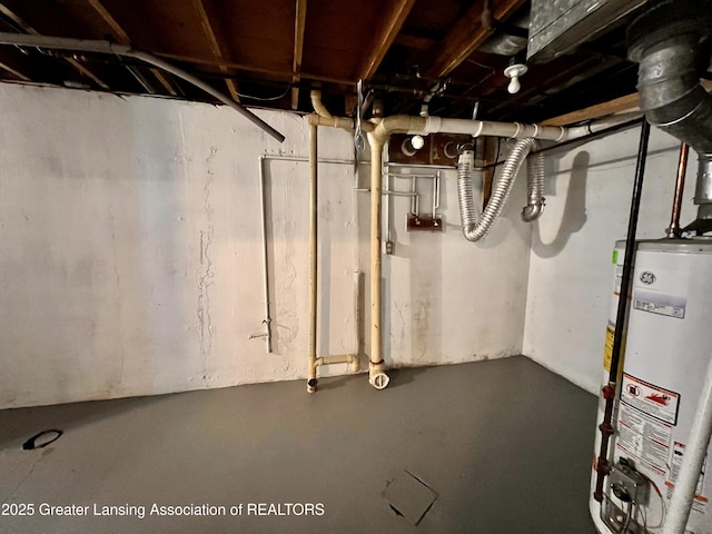 5401 Catalpa Dr, Lansing, MI 48911 - unfinished below grade area with gas water heater