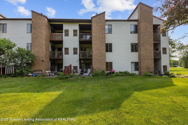 1457 E Pond Dr Unit 21, Okemos, MI 48864 - view of apartment building / complex