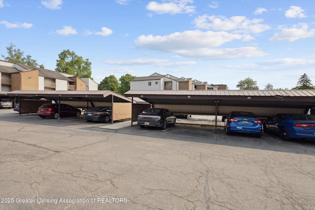 1457 E Pond Dr Unit 21, Okemos, MI 48864 - view of covered parking lot