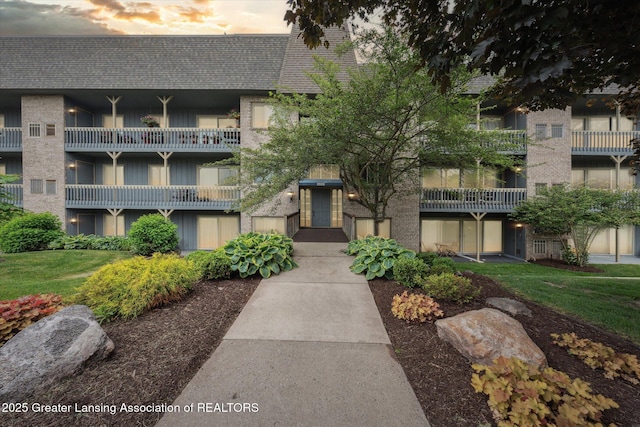 2926 Mount Hope Rd Unit 105, Okemos, MI 48864 - view of property at dusk