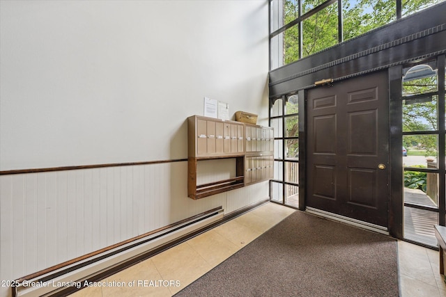 2926 Mount Hope Rd Unit 105, Okemos, MI 48864 - tiled entrance foyer with a high ceiling