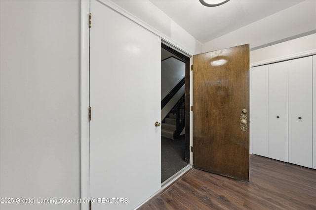 2926 Mount Hope Rd Unit 105, Okemos, MI 48864 - unfurnished bedroom with wood finished floors and a closet