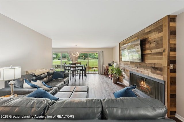 2926 Mount Hope Rd Unit 105, Okemos, MI 48864 - living room with a fireplace and wood finished floors