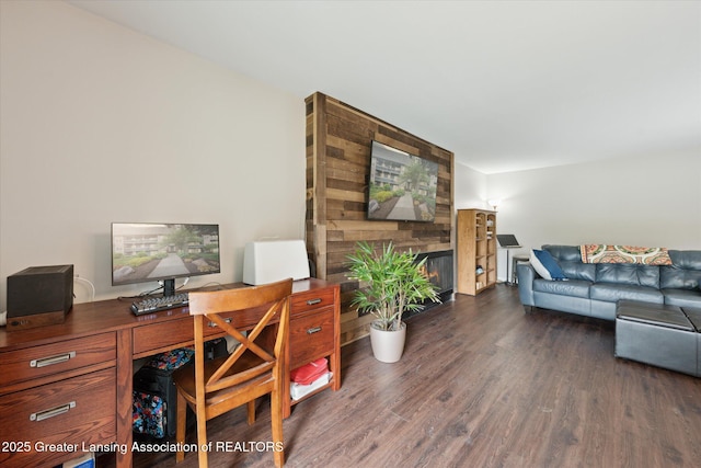 2926 Mount Hope Rd Unit 105, Okemos, MI 48864 - office area with wood finished floors and a glass covered fireplace