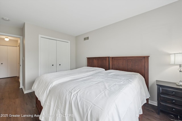2926 Mount Hope Rd Unit 105, Okemos, MI 48864 - bedroom with wood finished floors and a closet