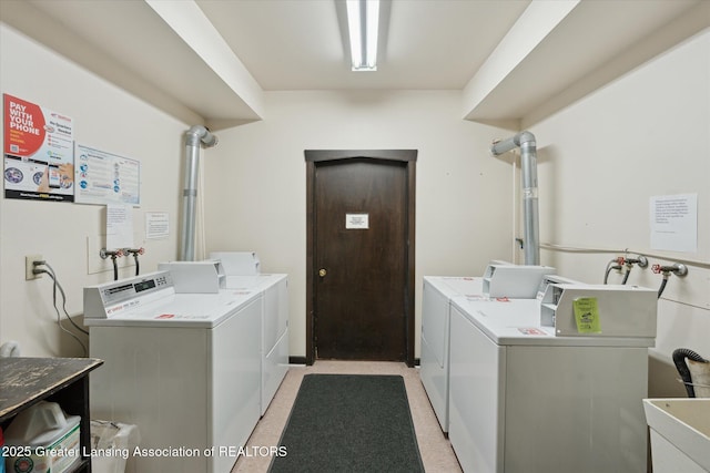 2926 Mount Hope Rd Unit 105, Okemos, MI 48864 - community laundry with washing machine and dryer