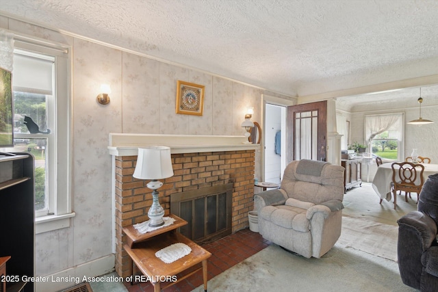 1213 N Woodworth Rd, Jackson, MI 49202 - living room with a brick fireplace, a textured ceiling, and crown molding
