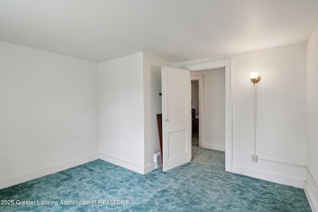 1213 N Woodworth Rd, Jackson, MI 49202 - spare room with carpet and baseboards