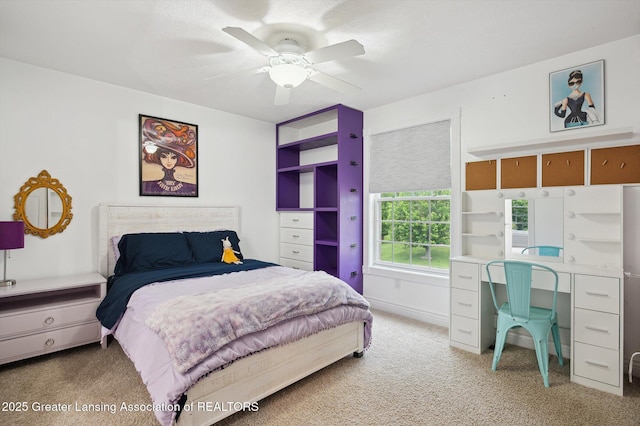 4700 Canyon Trl, Lansing, MI 48917 - bedroom featuring light carpet and ceiling fan