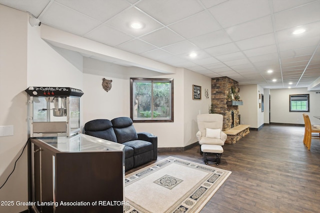 4700 Canyon Trl, Lansing, MI 48917 - living room with wood finished floors, recessed lighting, and a drop ceiling