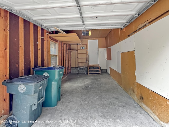 1869 E Burrwood Cir, East Lansing, MI 48823 - garage featuring a garage door opener