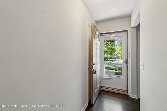 522 Cowley Ave, East Lansing, MI 48823 - entryway featuring dark wood-style flooring and baseboards