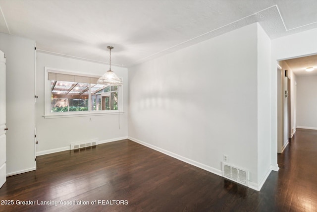 522 Cowley Ave, East Lansing, MI 48823 - unfurnished dining area featuring wood finished floors
