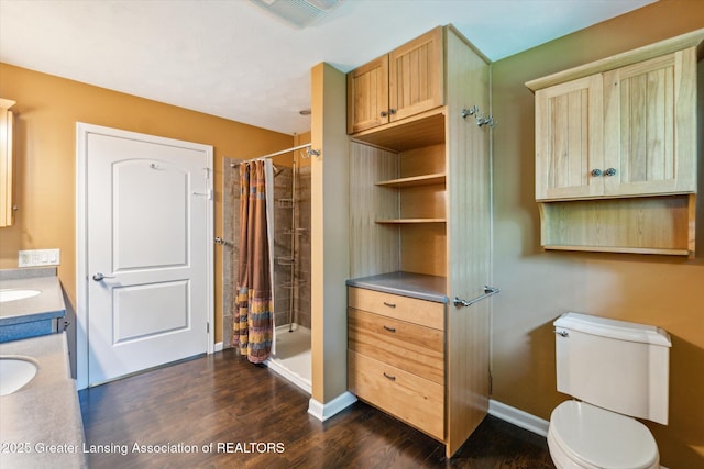 522 Cowley Ave, East Lansing, MI 48823 - full bath featuring wood finished floors, a shower stall, and vanity
