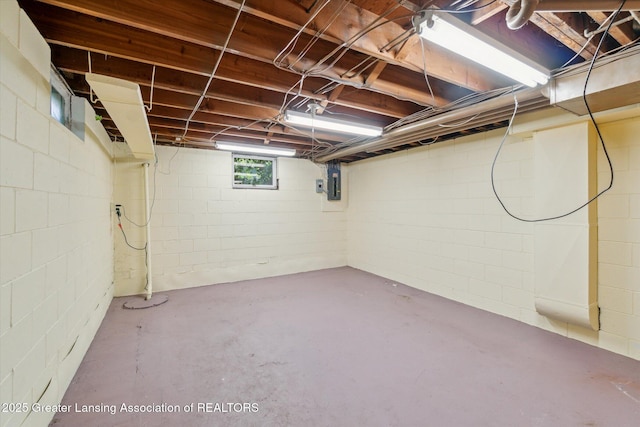 522 Cowley Ave, East Lansing, MI 48823 - basement featuring electric panel and concrete block wall