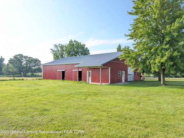 4963 E Portland Rd, Portland, MI 48875 - view of pole building with a lawn