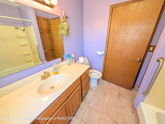 4963 E Portland Rd, Portland, MI 48875 - full bath featuring vanity, tile patterned floors, and bathing tub / shower combination