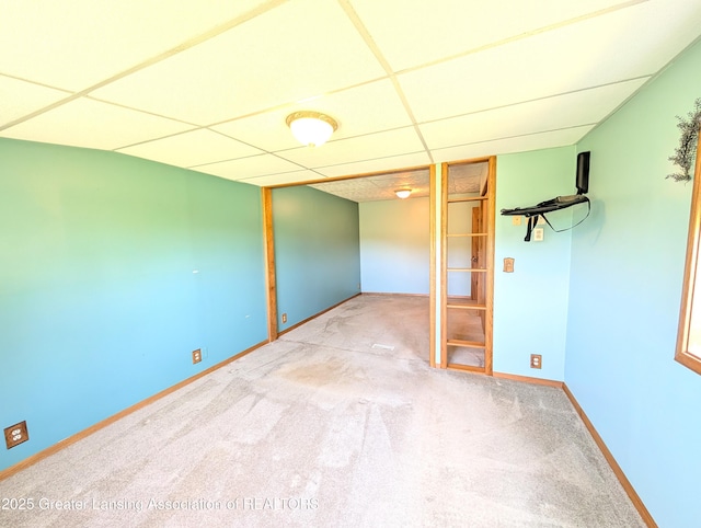 4963 E Portland Rd, Portland, MI 48875 - spare room featuring a drop ceiling and carpet flooring