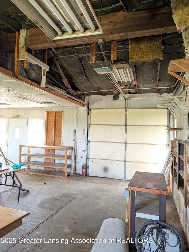 4963 E Portland Rd, Portland, MI 48875 - garage with a garage door opener