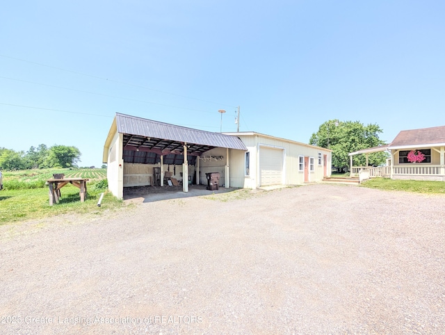 4963 E Portland Rd, Portland, MI 48875 - view of pole building featuring driveway