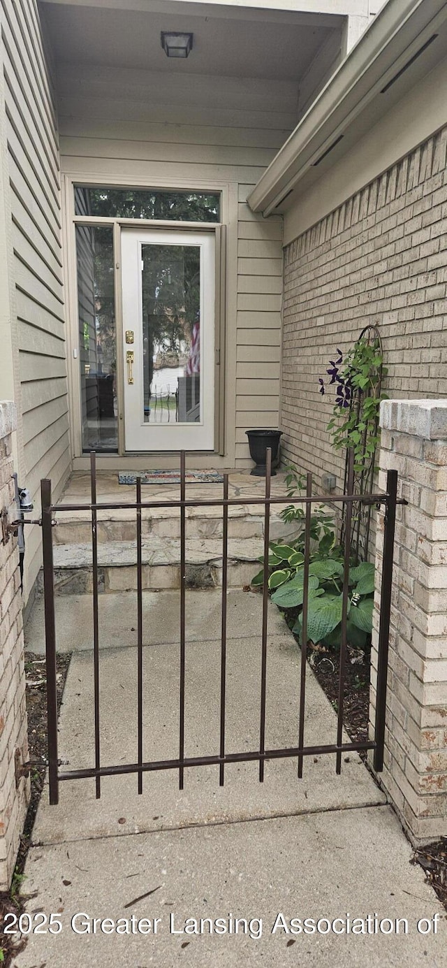 1945 W Danbury, Okemos, MI 48864 - entrance to property featuring brick siding