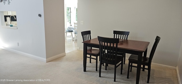 1945 W Danbury, Okemos, MI 48864 - carpeted dining room with baseboards