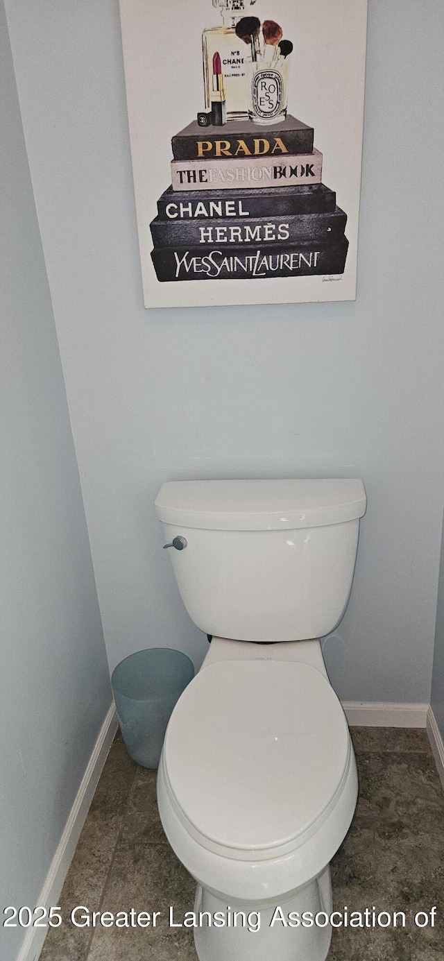 1945 W Danbury, Okemos, MI 48864 - bathroom featuring toilet and baseboards