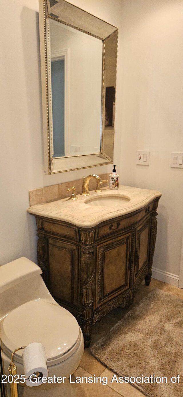1945 W Danbury, Okemos, MI 48864 - bathroom with vanity and toilet