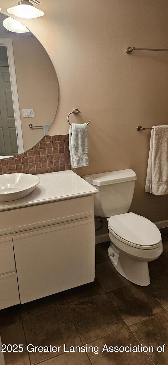 1945 W Danbury, Okemos, MI 48864 - half bath with vanity and tile patterned floors