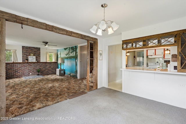 16544 S Chapin Rd, Elsie, MI 48831 - kitchen featuring carpet, under cabinet range hood, a chandelier, electric range, and ceiling fan