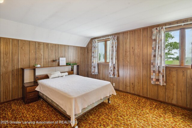 16544 S Chapin Rd, Elsie, MI 48831 - bedroom with wooden walls and vaulted ceiling