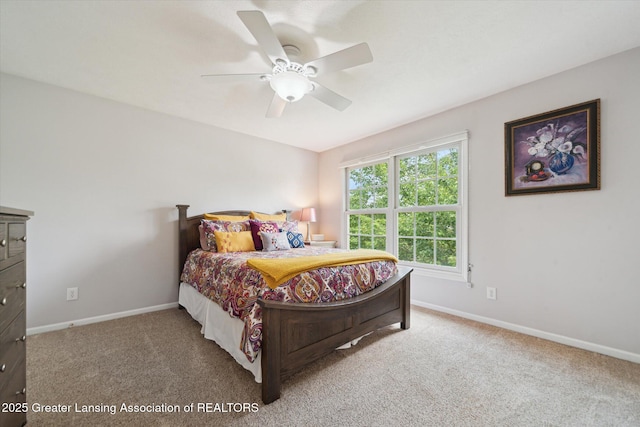 11195 Prestwick Dr, Lansing, MI 48917 - bedroom with carpet and ceiling fan