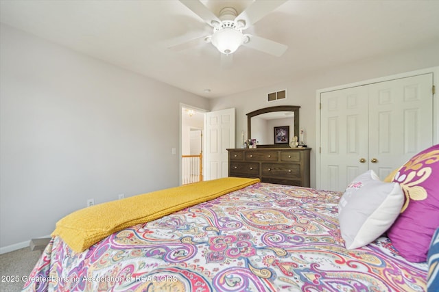 11195 Prestwick Dr, Lansing, MI 48917 - bedroom with a closet, carpet floors, and ceiling fan