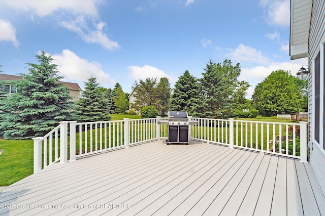 11195 Prestwick Dr, Lansing, MI 48917 - wooden terrace featuring a yard and grilling area