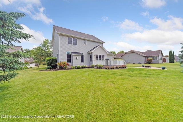 11195 Prestwick Dr, Lansing, MI 48917 - view of front facade featuring a front yard and a deck
