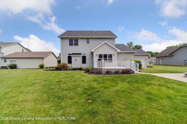 11195 Prestwick Dr, Lansing, MI 48917 - view of front of house with a front yard and a deck