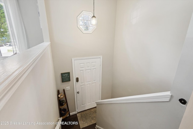 1539 Jacqueline Dr, Holt, MI 48842 - stairs with wood finished floors