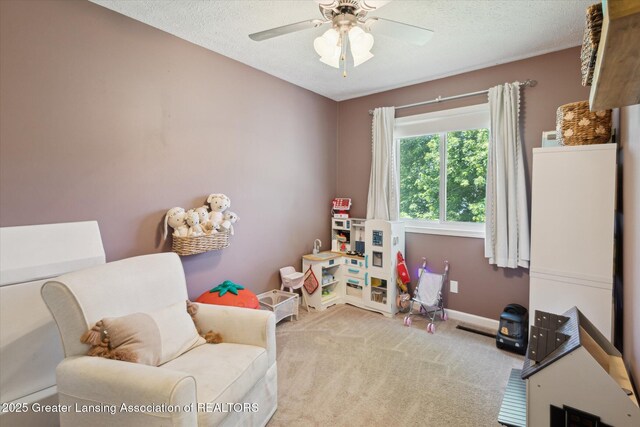 1539 Jacqueline Dr, Holt, MI 48842 - rec room featuring carpet flooring, ceiling fan, and a textured ceiling