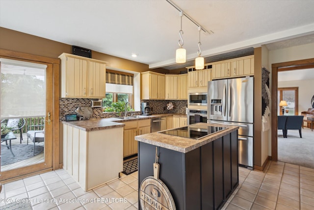 4925 Aspen Dr, Lansing, MI 48917 - kitchen featuring appliances with stainless steel finishes, light brown cabinetry, backsplash, a center island, and light tile patterned flooring