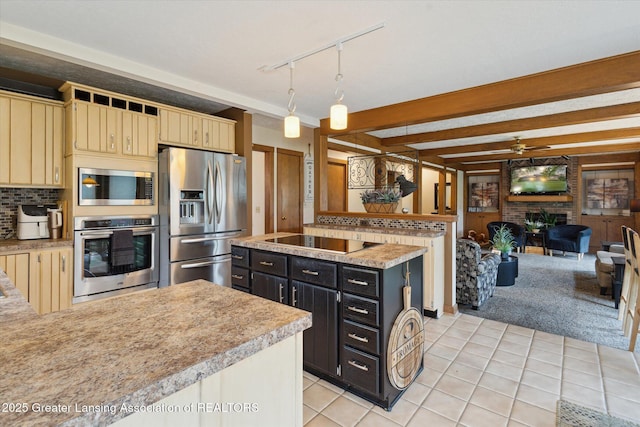 4925 Aspen Dr, Lansing, MI 48917 - kitchen with stainless steel appliances, light tile patterned floors, light countertops, a brick fireplace, and beam ceiling