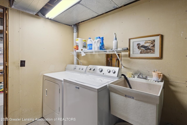 4925 Aspen Dr, Lansing, MI 48917 - washroom with washing machine and clothes dryer