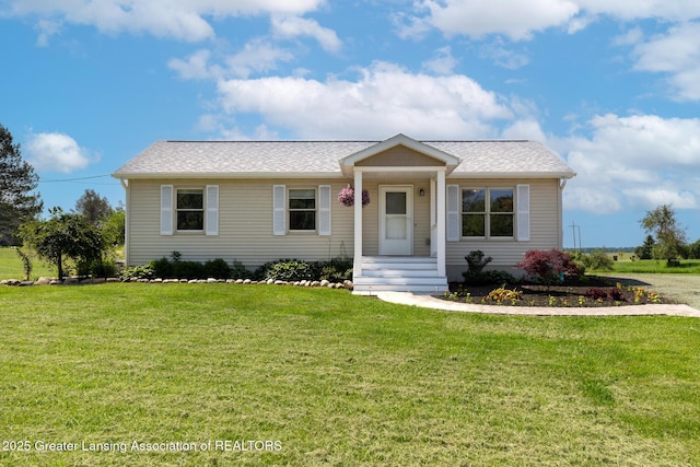 2520 Linn Rd, Williamston, MI 48895 - view of front facade featuring a front lawn and a shingled roof