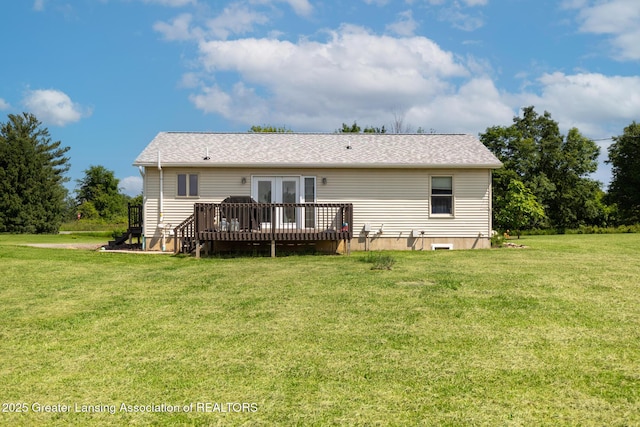 2520 Linn Rd, Williamston, MI 48895 - rear view of house featuring a wooden deck, french doors, and a yard