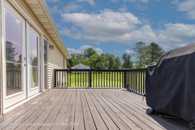 2520 Linn Rd, Williamston, MI 48895 - wooden terrace with a lawn and a grill
