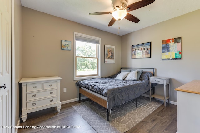 2520 Linn Rd, Williamston, MI 48895 - bedroom featuring dark wood-style floors and a ceiling fan
