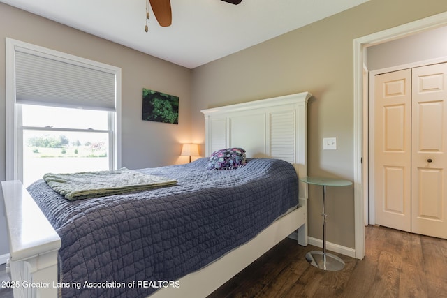 2520 Linn Rd, Williamston, MI 48895 - bedroom featuring dark wood-style flooring and ceiling fan